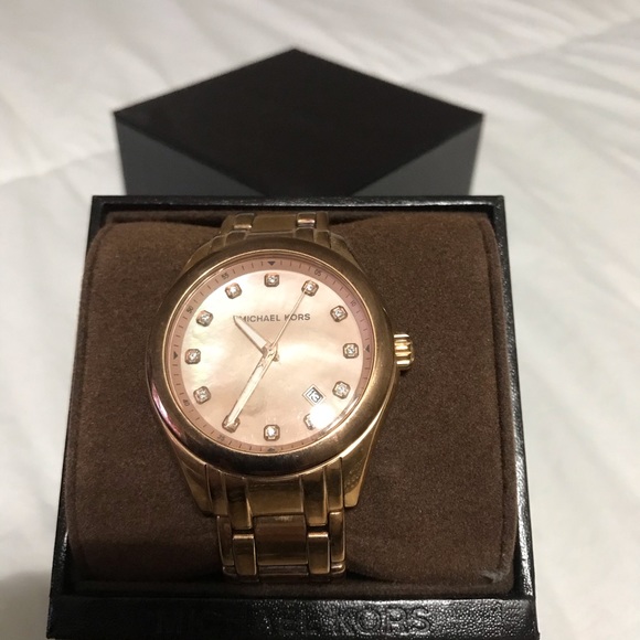Michael Kors women’s gold watch